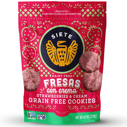 A stand-up pouch of Siete Dairy Free Fresas con Crema Strawberry & Cream Grain Free Cookies, featuring a red and green design with a central yellow logo.